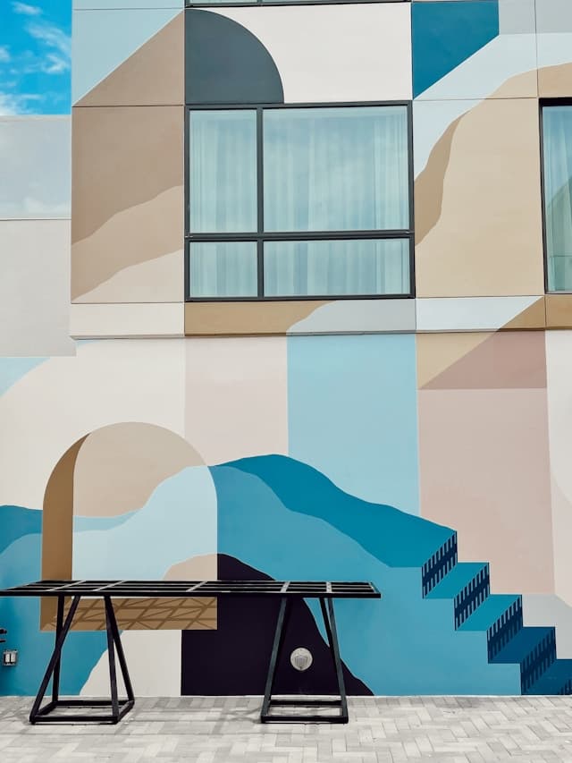 Painter applying paint with a roller